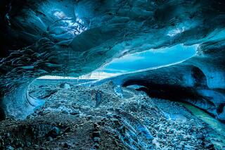 face of an ice man in an ice cave